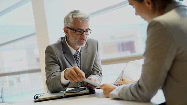 Coporate meeting between executive and employee