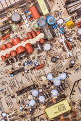 Vintage Electronic Components Detail On Circuit Board Background