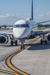 busy airport tarmac traffic before airplanes take off