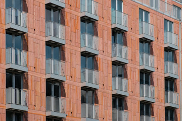 Obraz premium balconies on building facade - real estate background