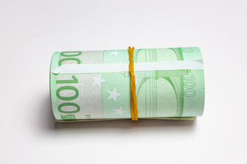 European currency; roll of Euro banknotes
