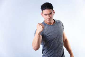 Fototapeta premium emotional guy on a light background