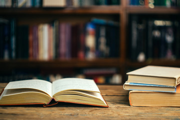 The book in the library (school, university, college) on the table. Learning and study concept. Copy space.