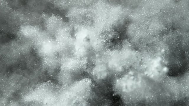 Super Slowmotion Shot of Silver Powder Explosion at 1000fps.