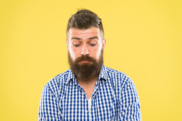 Obraz premium Beard as distinctive as you are. Brutal caucasian guy with beard on yellow background. Unshaven hipster with textured beard hair. Bearded man with stylish mustache and beard shape