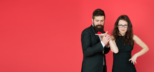 Engagement concept. Couple in love celebrate anniversary. Romantic gift box jewelry engagement. Marriage proposal. Handsome man and elegant woman in love. Romantic engagement. Proposal engagement