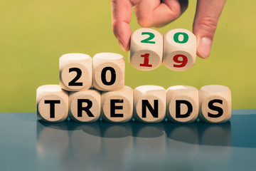 Hand turns cube and changes the expression "2019 Trends" to "2020 Trends".