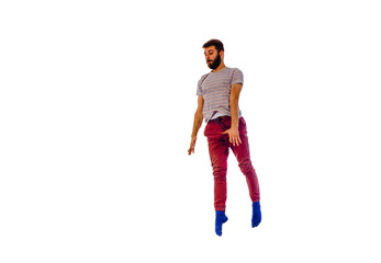 Man is dancing in the studio on a white background