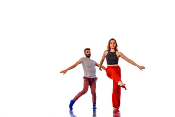 Sweet couple dancing social dance, isolated on white