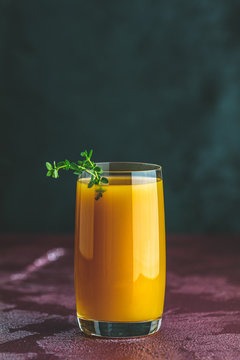Glass of fresh healthy peach smoothie or juice