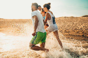 Fototapeta premium Friendship beach summer splash holiday concept