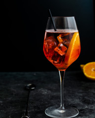 Wine glass with aperol spritz, italian alcoholic cocktail