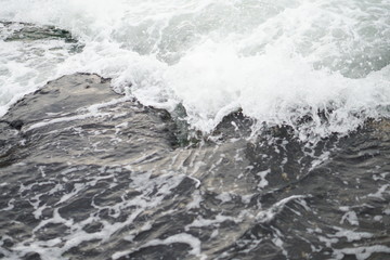 storm at sea, splashing water, waves.
