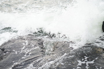 storm at sea, splashing water, waves.