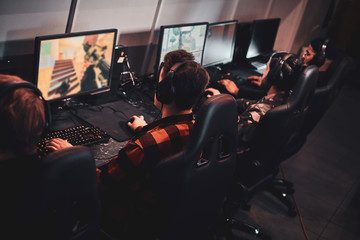 Busy team of gamers has an cyber championship with onother gamers.