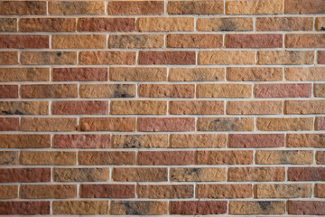Obraz premium Modern brick wall, brown brick wall textur for background . New multi-colored brick wall. texture background.