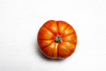 RED TOMATO ISOLATED ON WHITE BACKGROUND