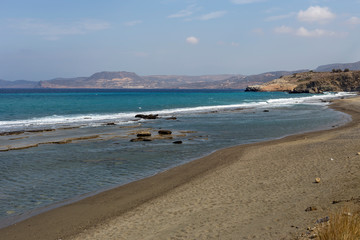 Deserted sandy beach on an autumn day