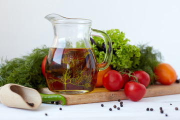 Composition with vegetables and spices on a table on a white background