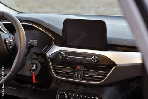 Screen multimedia system on dashboard in a modern car