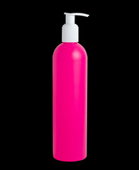 Blank pink plastic bottle isolated on black background. Packaging for liquid soap, cosmetic.