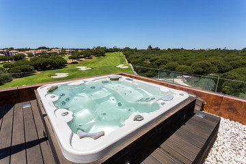 Jacuzzi bath with hydromassage on the roof of the villa. - obrazy, fototapety, plakaty