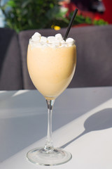 Glass of milkshake with marshmallow