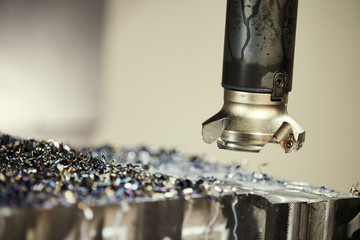 milling cnc machine at metal work industry. Multitool precision manufacturing and machining © Kadmy