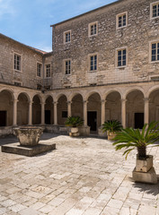 Fototapeta premium Courtyard in the Franciscan Monastery in the ancient old town of Zadar in Croatia