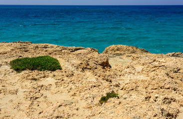 Fototapeta na wymiar amazing blue sea and cliffs off the coast of cyprus