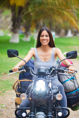 Fototapeta na wymiar beautiful native woman on a motorbike