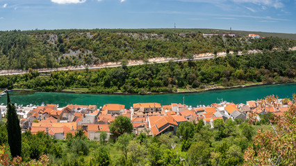 Colorful old village of Novigrad in Istria county of Croatia with blue river and harbor seen from the fortress