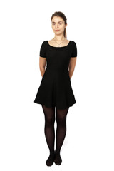 A young woman in a black dress with long hair