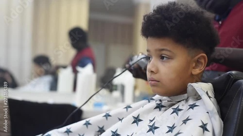 Boy In The African Barbershop Cute Mixed Boy Makes A