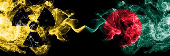 Bangladesh, Bangladeshi vs nuclear smoky mystic flags placed side by side. Thick colored silky smokes combination of Bangladesh, Bangladeshi flag and radioactive sign.