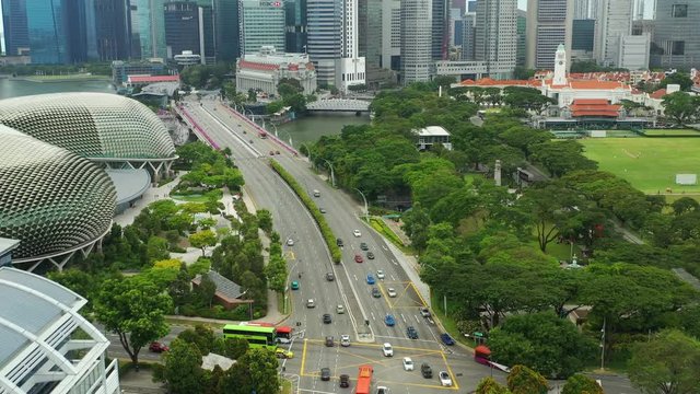 day time singapore city center famous hotel traffic street mall aerial panorama 4k 