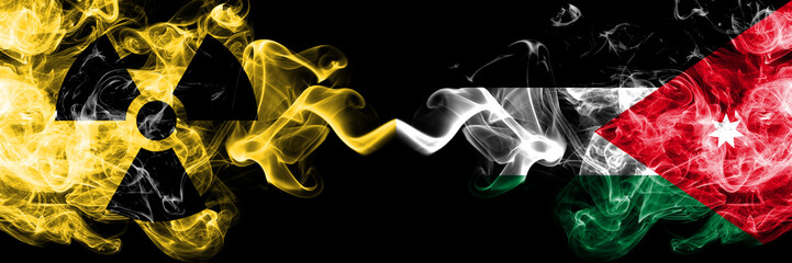 Jordan, Jordanian vs nuclear smoky mystic flags placed side by side. Thick colored silky smokes combination of Jordan, Jordanian flag and radioactive sign.
