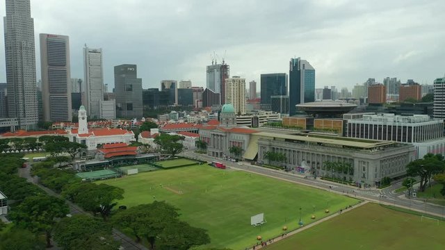 day time singapore city center famous downtown national gallery field aerial panorama 4k 
