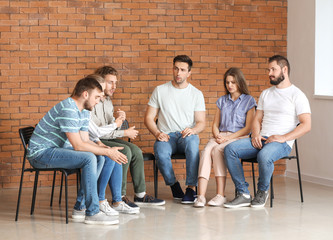 Young people at group therapy session