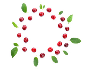 Frame made of tasty ripe cherry on white background