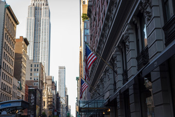 Obraz premium New York, NY / USA - May/27/2019: Skyscrapers of New York against the sky. The architecture of New York. Summer day in city