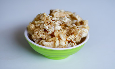 Chicken feet crackers or kripik ceker on white background. 