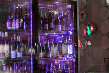 bottles refrigerator expensive wines   alcohol