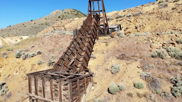 Wooden Gold Mine Head Frame with Sluice at Virginia City Nevada - Aerial Drone.