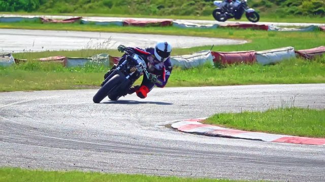 slow motion Fast motorcycle on motorsport circuit track