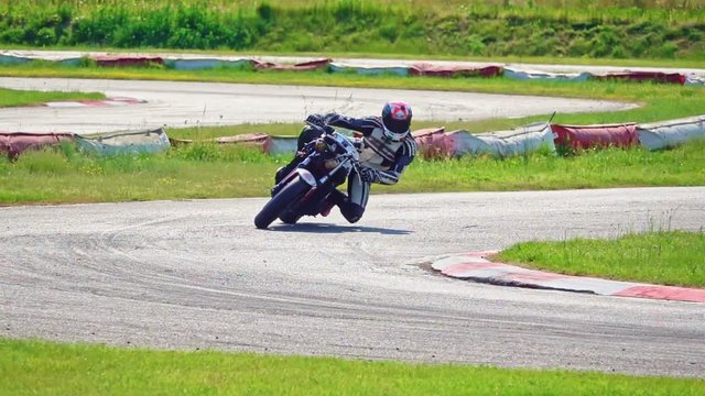 slow motion Fast motorcycle on motorsport circuit track