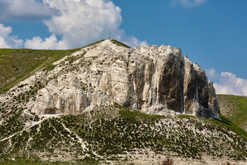 Landscape with chalk cliffs in the steppe and beautiful clouds