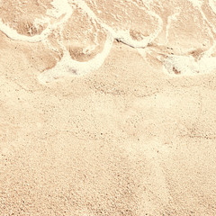 Sand textured  Background. Soft wave on sandy beach. Summer  Vacation concept.