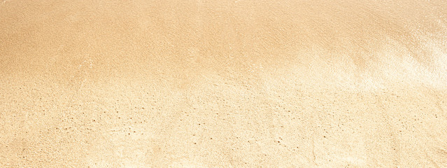 Wide Sand   Background. Soft wave on sandy beach. Summer concept.