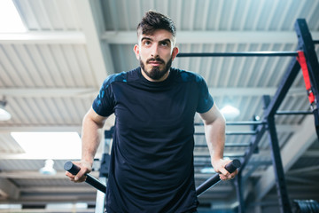 Fototapeta na wymiar bodybuilder man training in the gym